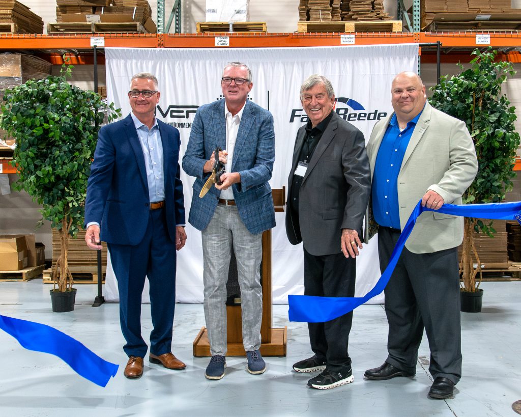 Kent Rice, president of Riverside Mfg., LLC; Fred Merritt, CEO of Riverside Mfg., LLC; Ray Barr, founder of Riverside Mfg., LLC; and David Rednour, senior vice president of sales and marketing at Riverside Mfg., LLC, celebrate the opening of the company's new Fort Wayne headquarters during a ribbon-cutting ceremony on July 8, 2026.